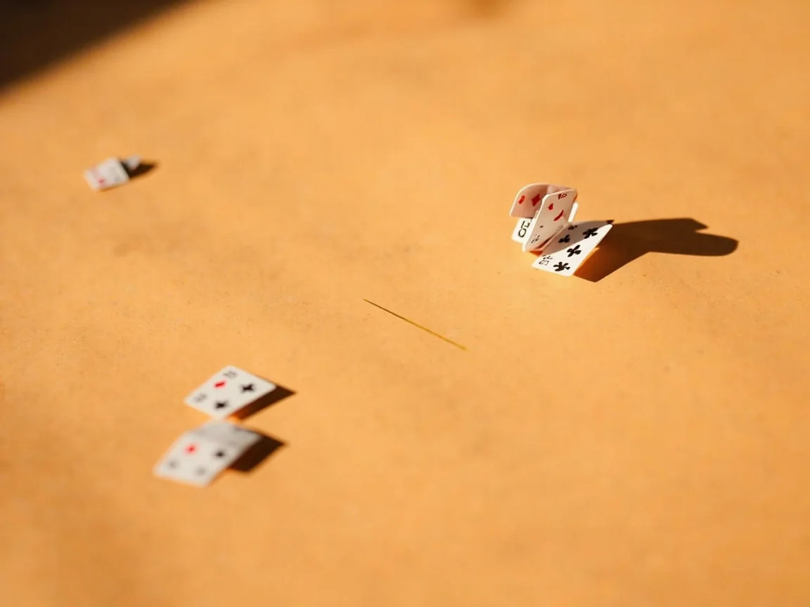 Side-by-side variant cards for Points, Deals and Pool formats arranged on matte sandstone paper in soft daylight.